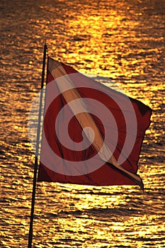 A Dive Flag warning boaters of a diver in the water.