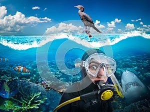 Diver in diving gear gasps under water