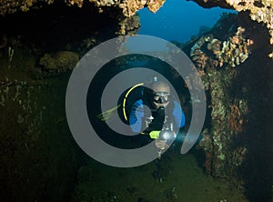 Diver Exploring Wreck