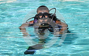 Diver with mask and regulator