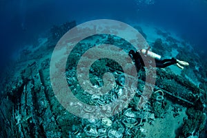 Diver over Underwater wreckage photo