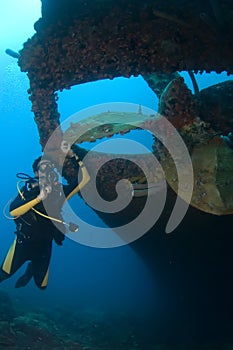 Diver with Propeller of wreck Hilma Bonaire