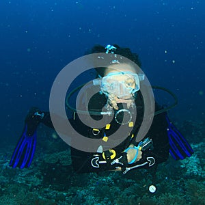 Diver - smiling girl underwater