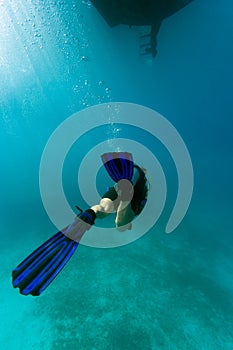 Diver under the boat