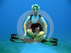 Diver weightless underwater