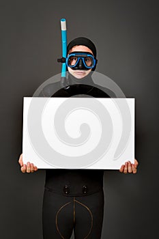 Diver with white billboard