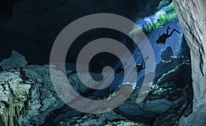 Divers Descend Into A cenote