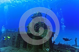 Divers exploring a shipwreck