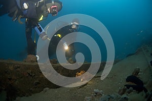 Divers exploring a wreck, Croatia