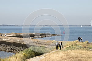 Divers on a jetty