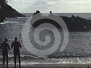 Divers at Red Sands Beach Maui Hana Hawaii