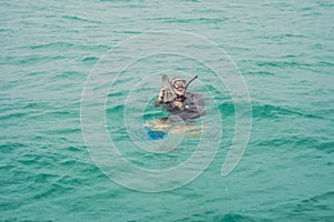 Divers on the surface of water ready to dive