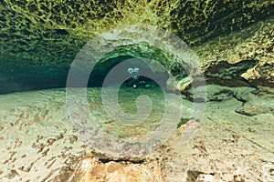 Divers underwater caves diving Ginnie Springs Florida USA