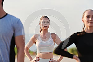 Diverse Athletic Warm-Up: Group Prepares for Intense Running Challenge.