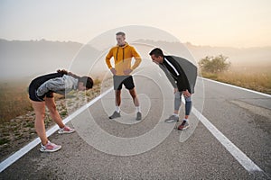 Diverse Athletic Warm-Up: Group Prepares for Intense Running Challenge.