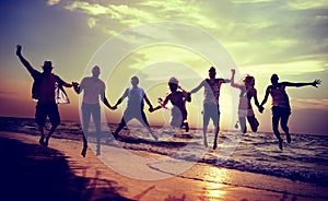 Diverse Beach Summer Friends Fun Jump Shot Concept photo