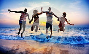 Diverse Beach Summer Friends Fun Jump Shot Concept
