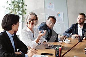 Diverse Business People Having Corporate Meeting In Modern Office