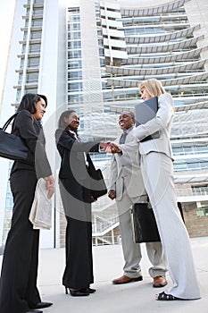 Diverse Business Team Handshake