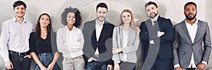 Diverse business team smiling to camera in office