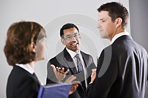 Diverse businesspeople conversing