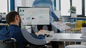 Diverse businesspeople using computer desktop, showing new startup idea