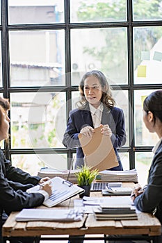 Diverse businesswoman leaders in office conference room Asian businesswoman