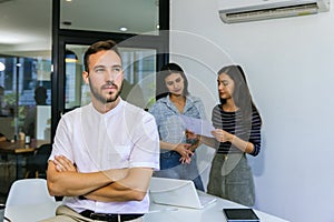 Diverse colleagues gather in brainstorm discuss statistics together.