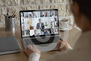 Diverse colleagues talk on video call having online briefing photo