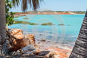 The diverse colours and beauty of Broome with red earth, yellow sand and turquoise waters photo