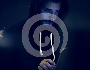 Diverse computer hacker hacking computer