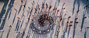 Diverse Crowd Standing on Sidewalk