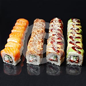 Diverse delicious sushi roll set on a black background with reflection, menu