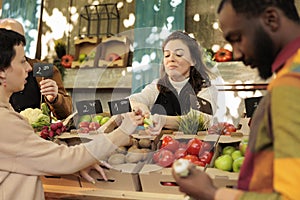 Diverse family couple tasting green apple varieties