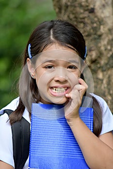 Diverse Female Student Under Stress Wearing Uniform