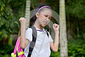 Diverse Girl Student And Anger With Books