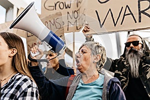 Diverse group of activists people protesting against war and violence.