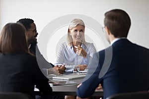 Diverse group of businesspeople holding constructive talks