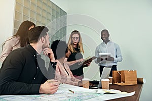 Diverse group of designers having a meeting in an office