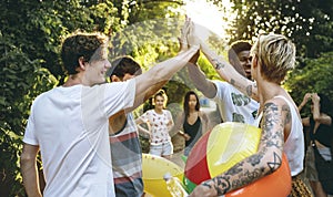 A diverse group of friends enjoying summer time together