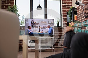 Diverse group of friends having fun with television movie