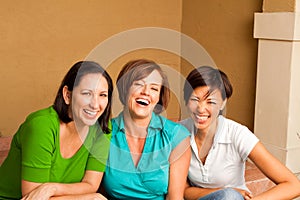 Diverse group of friends talking and laughing.