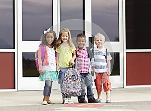 Diverse group of kids going to school photo