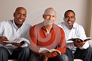 Diverse group of men studying together.