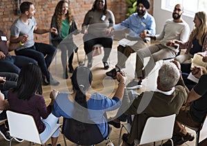 Diverse group of people in a seminar