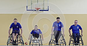Diverse group portrait of the basketball team in training, slow motion video of basketball persons with disabilities in