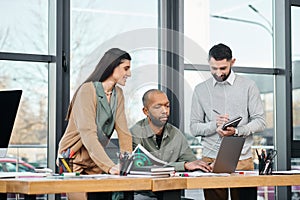 A diverse group of professionals gather