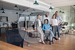 Diverse group of smiling businesspeople working in an office