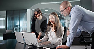 Diverse Group Of Software Programmers Collaborating In Extreme Coding Office