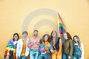 Diverse group of young people celebrating gay pride festival day - Lgbt community concept